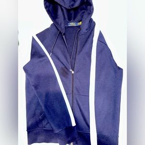 White stripe going down sleeve, logo is placed on back of hoodie